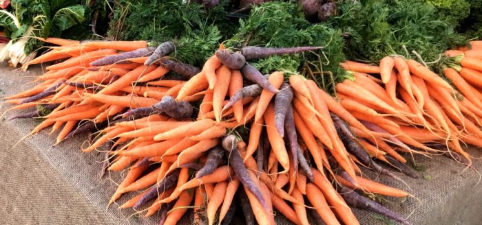 carrots in a Hampshire UK market in winter