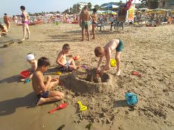 children playing on the beach at Grottamare in Le Marche