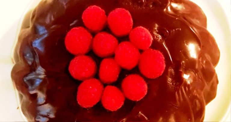 close up of biscuit de savoie with caramel chocolate ganache