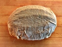 fruitcake wrapped in brandy soaked cheesecloth from Clountry Trading Company