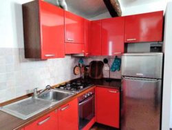 kitchen in Via Avesella rental apartment