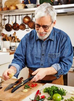 David Tanis cooking in an AARP publication