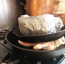 Italian spatchcock chicken with two iron frypans
