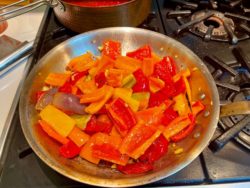 KD kitchen frying peppers for River Cafe Stufato, sweet pepper recipes