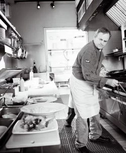 Tom Kee in his kitchen at Rail Stop from website